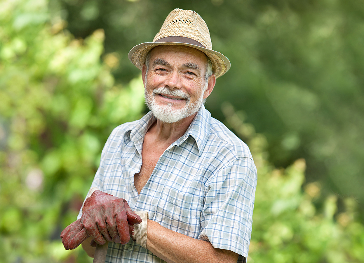 Smiling farmer in the garden – using humic acid